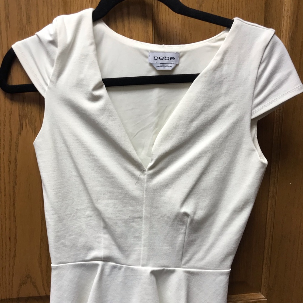 BEBE cream size medium v neck top